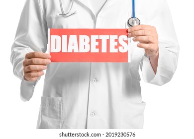 Doctor holding paper with word DIABETES on white background