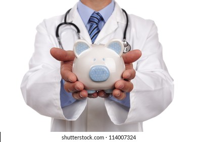 Doctor holding piggy bank concept for healthcare insurance fees and savings for medical expenses
