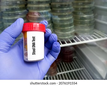 Doctor Holding A Plastic Container With Stool Sample For Stool DNA Test, It's New Method To Screen For Colon Cancer