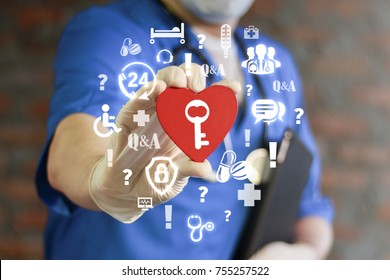 Doctor Holding Red Heart With Key Icon On Virtual Interface. Healthcare Secure Concept. Open Secure Medical Data. Trust And Love Of Medicine. Health Care Assistance Center. Secret Healthy Life Style.