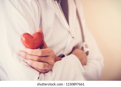 Doctor Holding Red Heart With Stethoscope, Heart Health,  Health Insurance, Telehealth, Online Consulting Concept