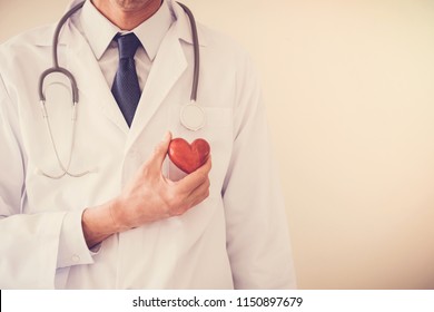 Doctor Holding Red Heart With Stethoscope, Heart Health,  Health Insurance, Telehealth, Online Consulting Concept