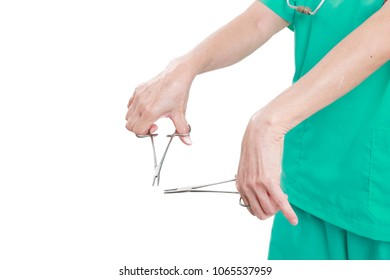 Doctor Holding Scissors During Operation