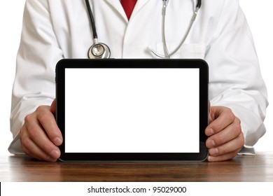 Doctor Holding Up And Showing Digital Tablet With A Blank Screen.