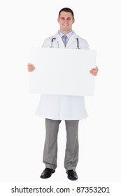 Doctor Holding A Sign On White Background