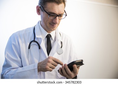 Doctor Holding Smartphone