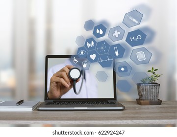 Doctor Holding Stethoscope With Health Icons Flow From Home Or Office Laptop Computer On Virtual Screen, Medical Technology, E Health Or Online Service, Telemedicine Concept