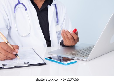 Doctor Holding A Tablet With Message,