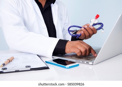 Doctor Holding A Tablet With Message,