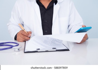 Doctor Holding A Tablet With Message,