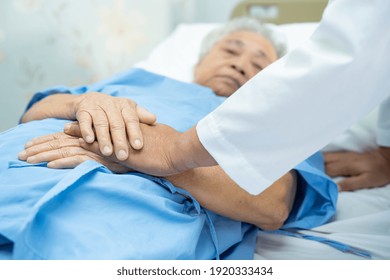 Doctor Holding Touching Hands Asian Senior Or Elderly Old Lady Woman Patient With Love, Care, Helping, Encourage And Empathy At Nursing Hospital Ward, Healthy Strong Medical Concept