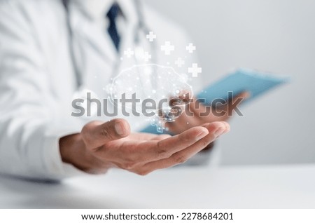 Doctor holding virtual human brain with ai artificial brain technology, idea creative intelligence thinking or Awareness or mental health care in futuristic.