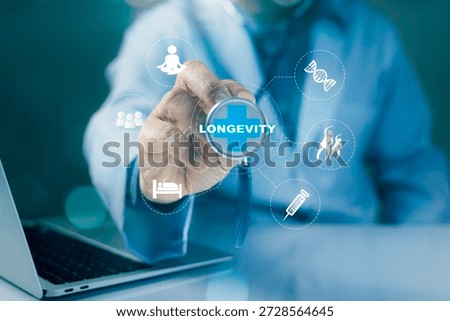 Doctor holding virtual  longevity interface with health, lifestyle and medical icons.wellness and longevity preventive healthcare Concept. medical innovation and healthcare technology.