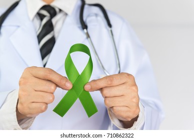 Doctor Holds Green Ribbon,  World Lymphoma Awareness Day September 15th.