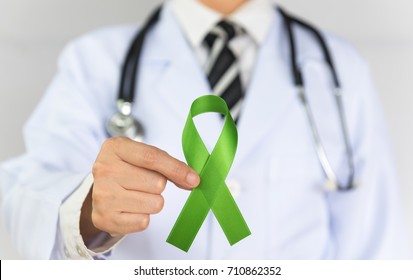 Doctor Holds Green Ribbon,  World Lymphoma Awareness Day September 15th.