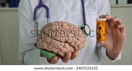 Doctor holds psycho neurological pills for brain in hands. Dementia alzheimer disease