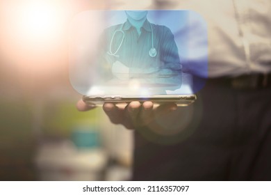 Doctor In Hologram Screen In Mobile Phone Communication In Tele Health Medicine Concept