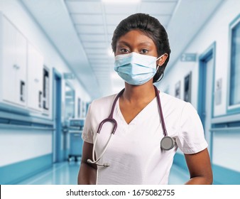 Doctor in hospital hallway wearing a mask with a worried expression