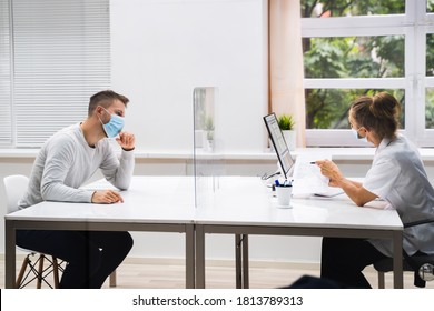 Doctor In Hospital Healthcare Consultant Meeting With Face Mask