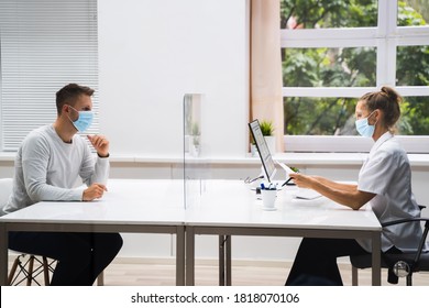 Doctor In Hospital Healthcare Consultant Meeting With Face Mask