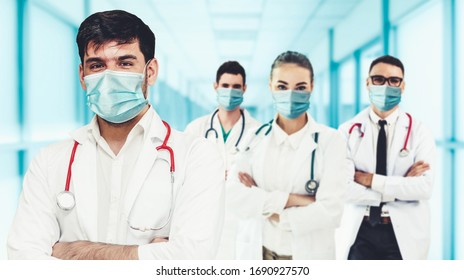 Doctor at hospital wearing medical mask to protect against coronavirus 2019 disease or COVID-19 global outbreak. - Shutterstock ID 1690927570