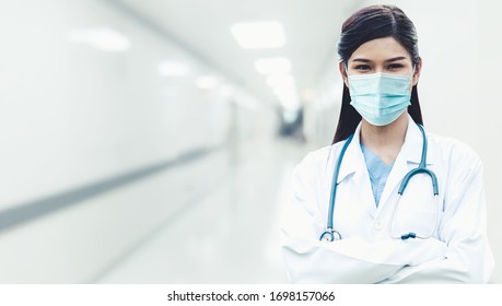 Doctor at hospital wearing medical mask to protect against coronavirus 2019 disease or COVID-19 global outbreak. - Shutterstock ID 1698157066