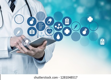 Doctor at hospital working with tablet - Shutterstock ID 1281048517