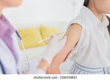 Doctor Inject Vaccine To Woman, Deltoid Muscle Injection Technique, Immunization And Health Care Promotion