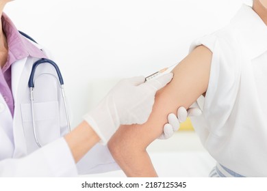 Doctor Inject Vaccine To Woman, Deltoid Muscle Injection Technique, Immunization And Health Care Promotion