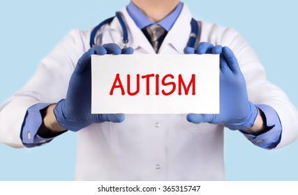 Doctor Keeps A Card With The Name Of The Diagnosis -?? Autism. Selective Focus. Medical Concept.