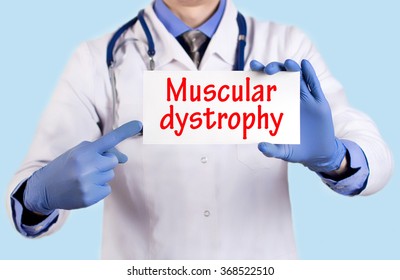 Doctor Keeps A Card With The Name Of The Diagnosis -?? Muscular Dystrophy. Selective Focus. Medical Concept.