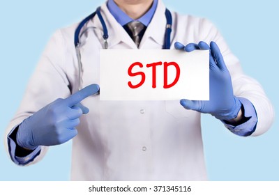 Doctor keeps a card with the name of the diagnosis -?? std. Selective focus. Medical concept.