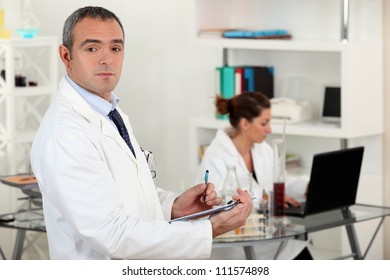 Doctor in a laboratory - Powered by Shutterstock