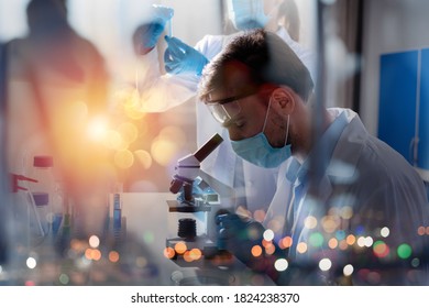Doctor in the laboratory analyzes samples under a microscope. Pharmaceutical treatment concept.