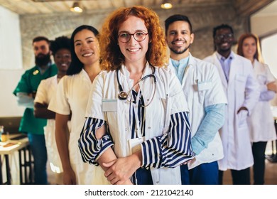 Doctor Leading A Medical Team At The Hospital - Hospital, Profession, People And Medicine Concept