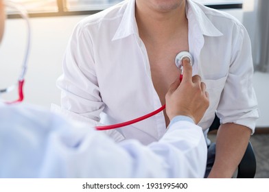 The doctor listens to the heartbeat to determine the cause of the abnormal heartbeat. And treatment plan to know the disease before illness in hypertension and enlarged heart - Shutterstock ID 1931995400