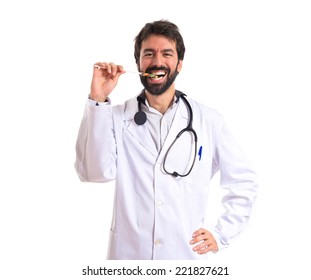 Doctor With Lolly Pop Over White Background