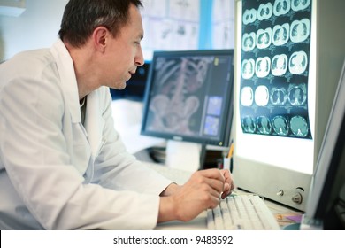 Doctor Looking At Ct Scan