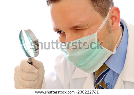 doctor is looking at magnifying glass on the white background