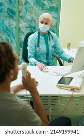 Doctor Looking At Patient, Passing Spirometry Test