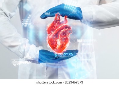 The doctor looks at the Heart hologram, checks the test result on the virtual interface, and analyzes the data. Heart disease, myocardial infarction, innovative technologies, medicine of the future - Powered by Shutterstock