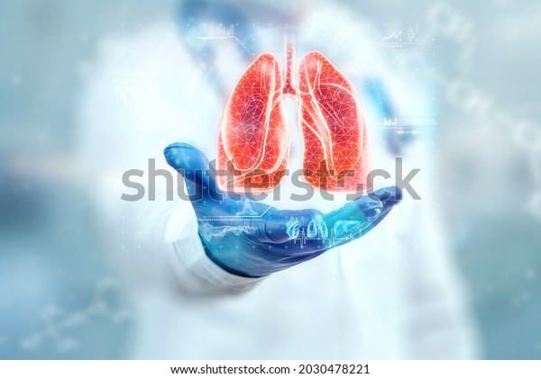 The\
doctor looks at the hologram of Lungs, checks the test result on\
the virtual interface and analyzes the data. Pneumonia, donation,\
innovative technologies, medicine of the\
future