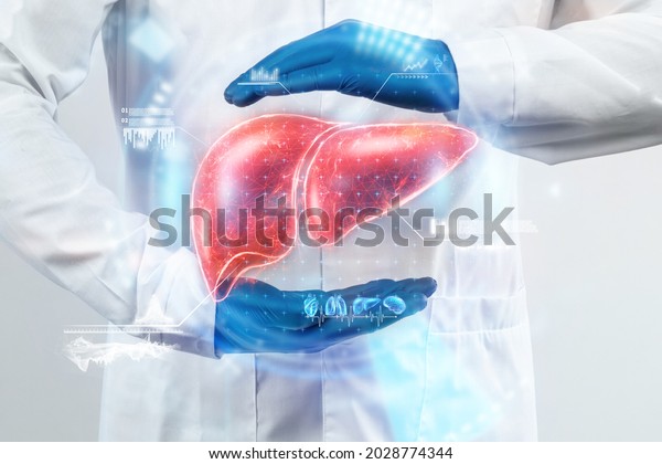 The\
doctor looks at the Liver hologram, checks the test result on the\
virtual interface, and analyzes the data. Liver disease, donation,\
innovative technologies, medicine of the\
future.