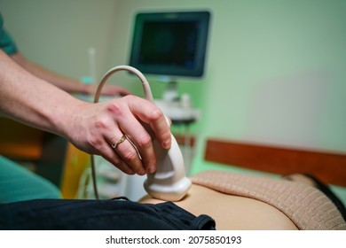 Doctor Makes Abdominal Ultrasound To A Patient. Medical Research. Selective Focus. Close-up