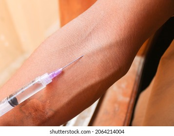 A Doctor Makes An Injection Into A Vein. Intravenous Drug Administration. The Concept Of Providing Professional Medical Care