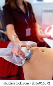 Doctor Making Abdominal Ultrasound To The Patient. Medical Research. Selective Focus. Close-up