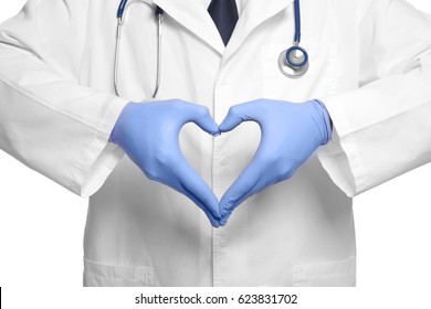 Doctor Making Heart With His Hands On White Background