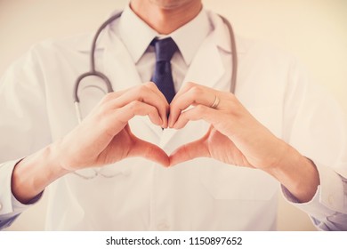 Doctor Making His Hands In Heart Shape, Heart Health,  Health Insurance, Telehealth, Online Consulting Concept