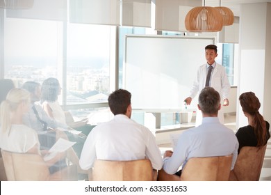 Doctor Making Presentation To Medical Staff In Hospital