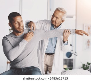 Doctor, man and patient with stretching for shoulder pain with physical therapy, examination or body recovery. Orthopedic, physician or medical expert for arm rehabilitation with healthcare or advice - Powered by Shutterstock